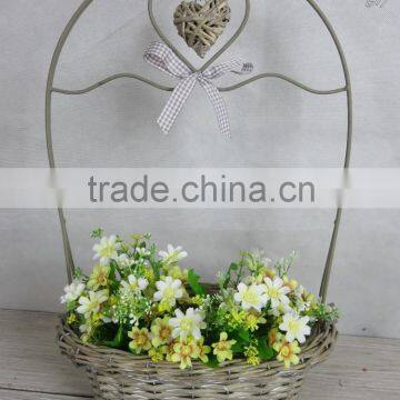 Decorative wicker heart oblong basket with KD metal handle and ribbon bow