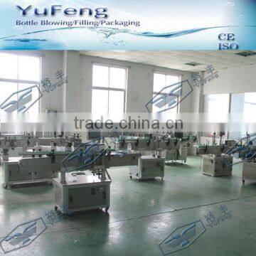Automatic plastic bottle labeling machine with stick labels