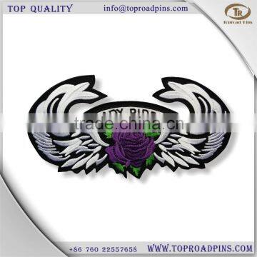 cheap custom fabric embroidery lady ride patches with self-adhesive ( hot cut border )