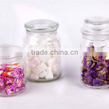 transparent glass candy jar with glass lid