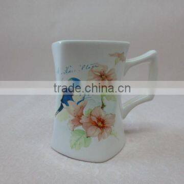 fine decal with bird and pink flower ceramic mug