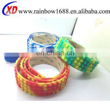 Hot Selling Adhesive Nimu Loops Silicone Legoes Toy Brick Tape, Building block rolling strap