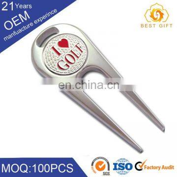 Foldable golf divot tool / pitchfork with personalized logo
