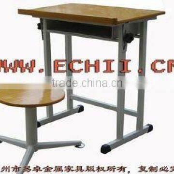 Durable old metal school desk and chair