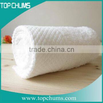 100% cotton Unbleached solid terry logo hotel towel