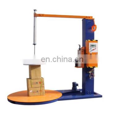 Manufacturer of Brick and cement pallet stretch wrap machine and stretch wrapper