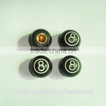 New style tire valve caps with 8-ball design