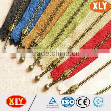 Shenzhen China xly zipper factory developing new product antique brass metal zipper