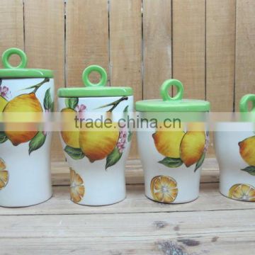 Home used ceramic storage jars with lemon decal