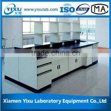 Biology laboratory island bench with reagent shelf