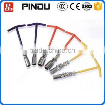 Multi-purpose combination sparking plug spanner wrench