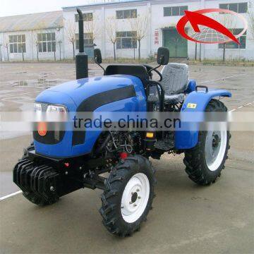 small farm tractor with trailer and front end loader