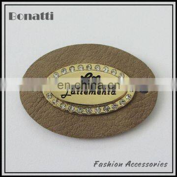 hot sale oval shape debossed PU jean leather label for garments and shoes