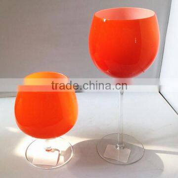 garish pink colorful wine glass with long stem