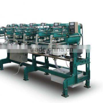 Winding machine with automatic oiling system