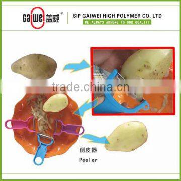 Plastic fruit and vegetable peeler