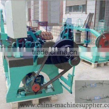 Barbed wire making machine