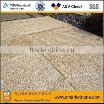 Yellow bush hammered sandstone