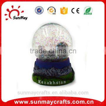 Hot sale polyresin Kazakhstan souvenir snow globe for sale