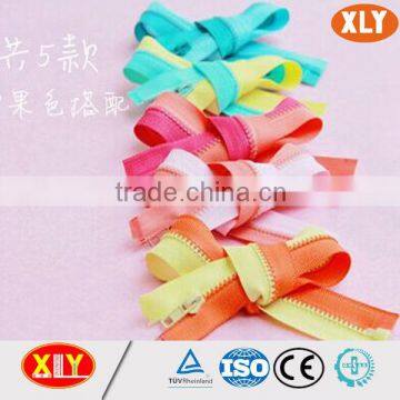 high quality wholesale shenzhen xly fancy contrast chain plastic zipper