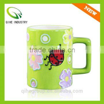 Light green ceramic coffee cup with animal print