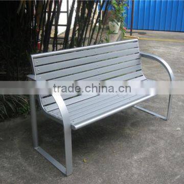 Wooden bench with metal legs and wood plastic composite slats seating