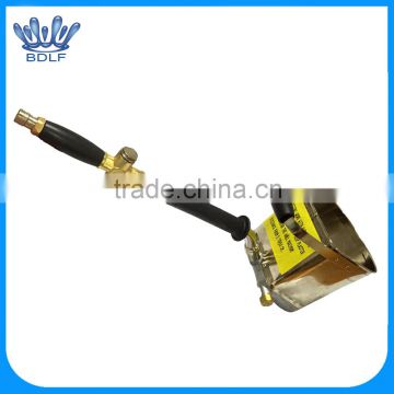 High pressure cement spray gun