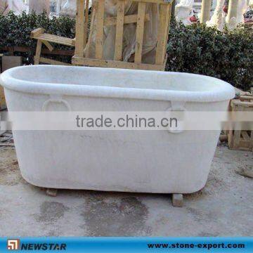 white marble stone bathtub