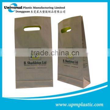 Eco-friendly degredable punched out handle plastic bag