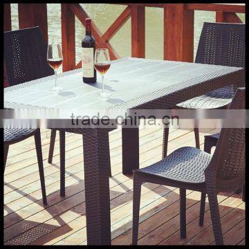 Brown Plastic Table and Chair photo-2
