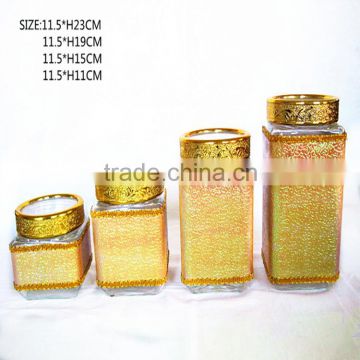 Glass jar with golden leather casing