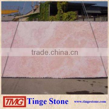 Natural backlit pink onyx marble slab