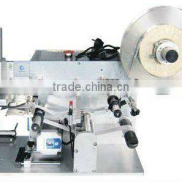 Semi-automatic bottle labeling machine