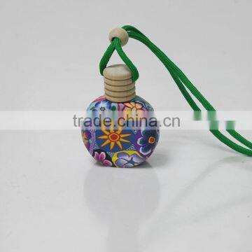 Shenzhen Lihome custom shape hanging car perfume bottles with flower decial