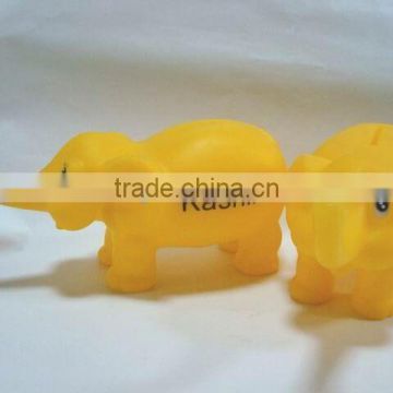 factory making yellow elephant money box