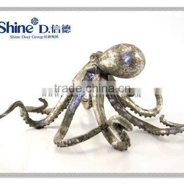 Silver foil finish octopus fish statue