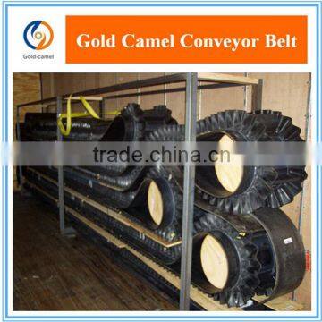 Economic incline cleated belt conveyor