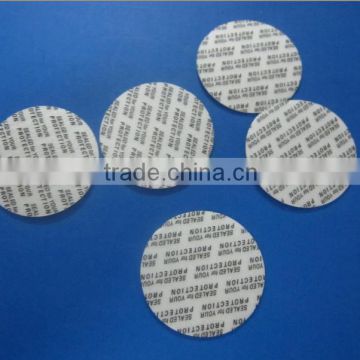 Pressure sensitive cap sealing gaskets