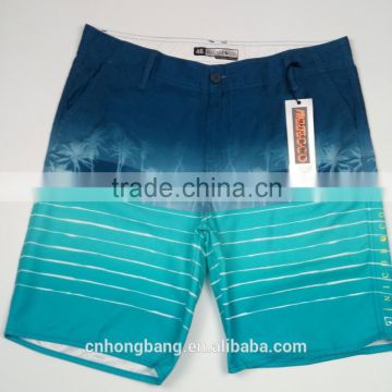 100% polyester sublimation print fabric made boardshorts in stock for men's surfing