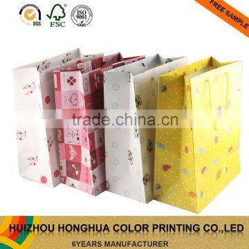Wholesale custom luxury shopping packaging paper gift bags with handles