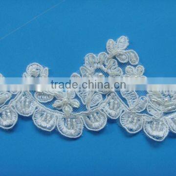 Thin lace with beads and sequins on wedding dresses