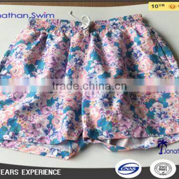 2017 Men's 100% polyester floral print swimming shorts.