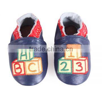 Fashionable boys shoes with letter