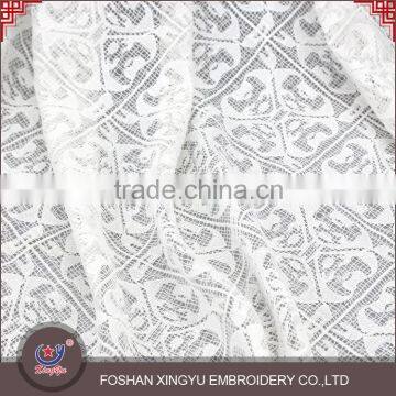 Custom made promotional dresses of net brocade lace fabric wedding with cutwork embroidery