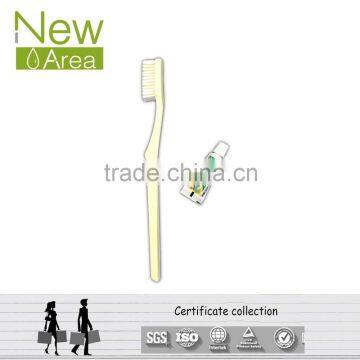 simple type white color disposable hotel dental kit toothbrush with toothpaste inside