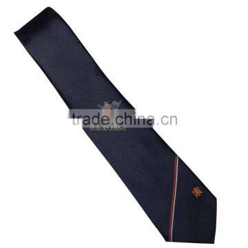 Club plain tie in blue with logo