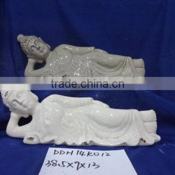 white ceramic buddha