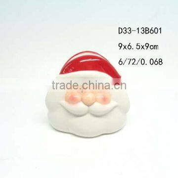 Santa Claus shaped ceramic napkin rings for Christmas