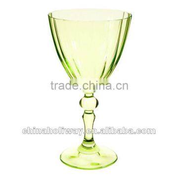 Elegent optic wine glass with green coloured