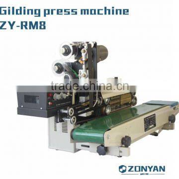 Gilding press machine